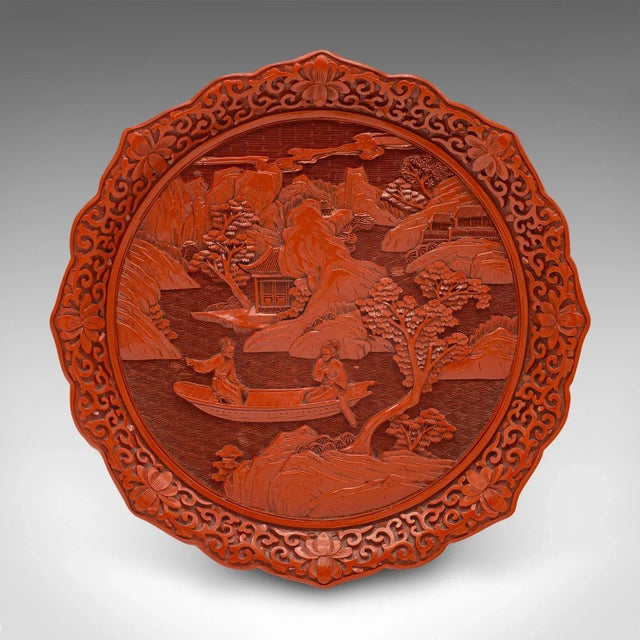 This is a vintage Cinnabar display plate. A Chinese, decorative serving dish, dating to the late 20th century, circa 1980....
