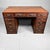 Beautiful Japanese desk from the 1930s. The wood showcases a stunning grain with a deep, warm color. This piece of...