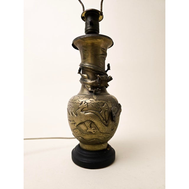 Elevate your space with this stunning late-19th/early-20th-century Chinese bronze lamp, masterfully cast with a sinuous...