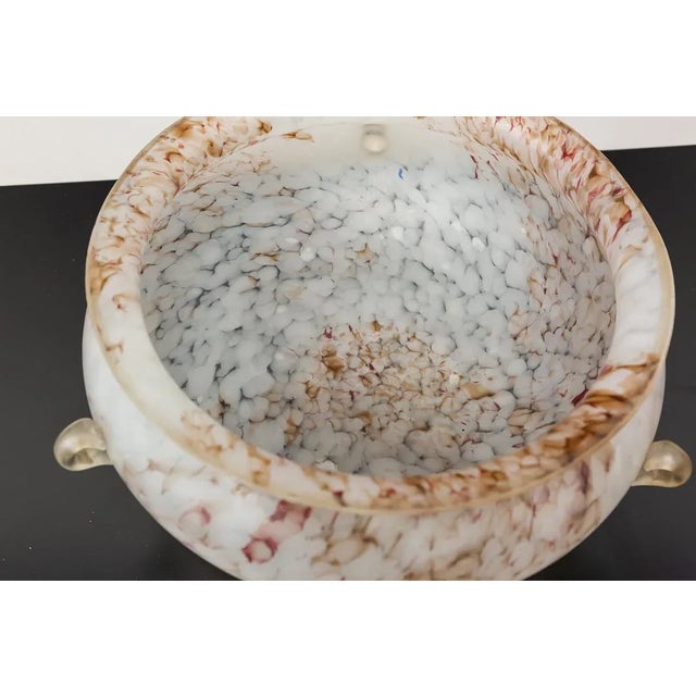 Large modernist centerpiece in transparent glass with mottled white and maroon. Circular mouth with a diameter of 30.5 cm,...
