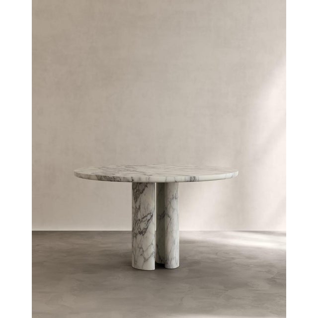 Roman dining table ii in arabescato marble by paloma editions dimensions: d 130 x w 130 x h 75 cm. Materials: marble. The...