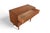 This three-drawer chest is styled in the manner of Arne Vodder, with a finished back that allows it to float freely in a...