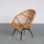 A nice easy chair by Dutch manufacturer Rohé in highly recognizable style! Made of natural rattan in nice curved shapes....