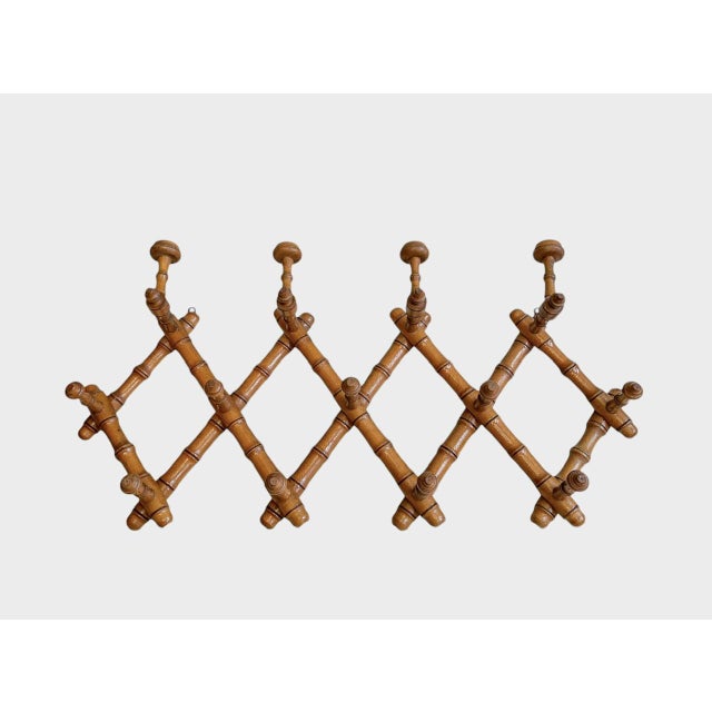 Antique Faux Bamboo Coat Rack made in France around 1920. This “harmonica” coat rack is practical and very decoratieve...