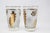 Set of two vintage cocktail glasses. Manufactured by Libbey. 1950s Hollywood Regency. Decorated with a classical gold lief...