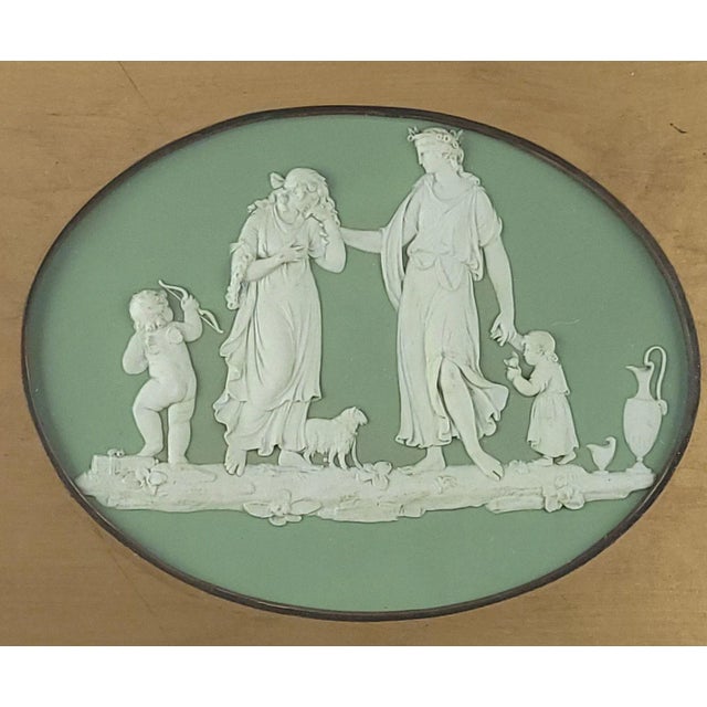 An antique Wedgwood oval Neoclassical plaque, England, 19th century.