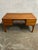 A sleek Danish designed teak desk with clean lines, 4 drawers, and a bookshelf back making it the perfect centerpiece of...