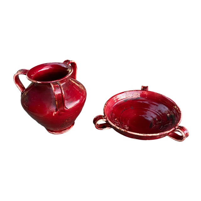 This striking set of handcrafted Fortunata pottery pieces brings rich Mediterranean warmth to any space. Finished in a...