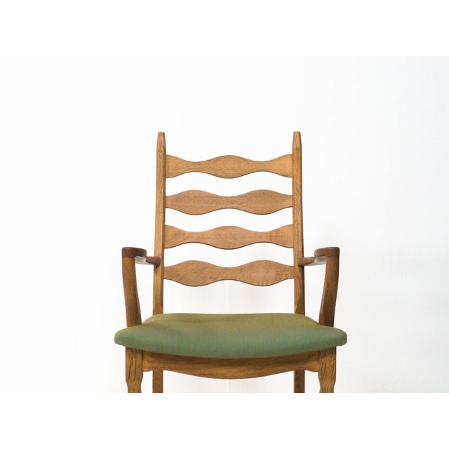 Danish design arm/side chair designed by Henning Kjaernulf for Nyrup Møbelfabrik of Denmark, 1960s. This rare model arm...
