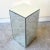 Amazing vintage Postmodern mirrored pedestal. Each side features a beveled mirror.
