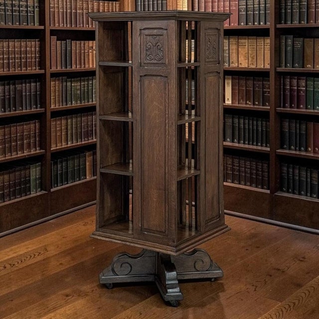 Created for the cultivated private library, this 19th century French revolving bookcase reflects the Renaissance Revival...