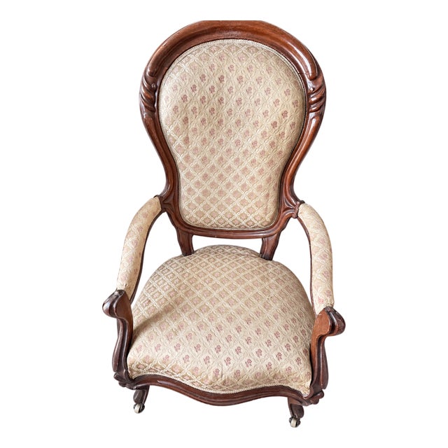 Victorian-Style Balloon-Back Parlor Armchair With Patterned Upholstery & Casters For Sale