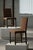 A distinguished set of four “Gillberga” dining chairs by Nordiska Kompaniet, designed in 1923 and emblematic of early...