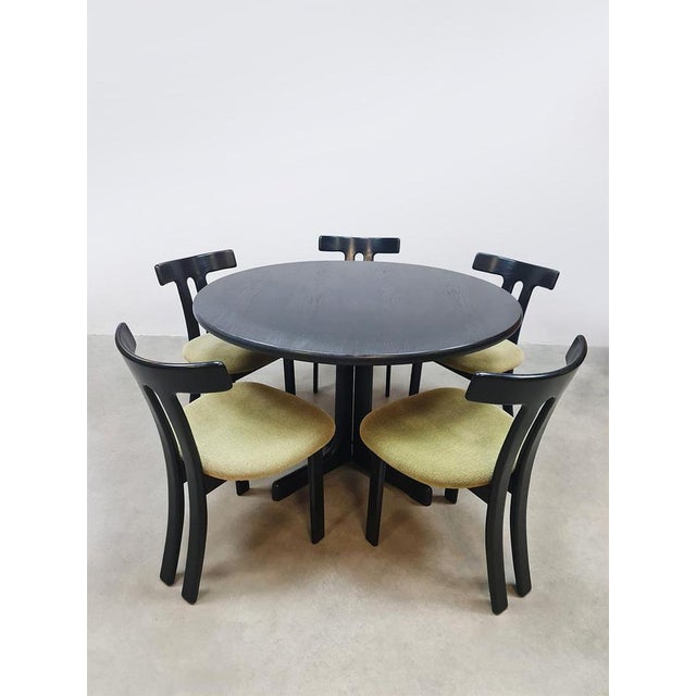 This beautiful dining room set consisting of 5 dining room chairs with extendable table is from the 60s. The chairs are...