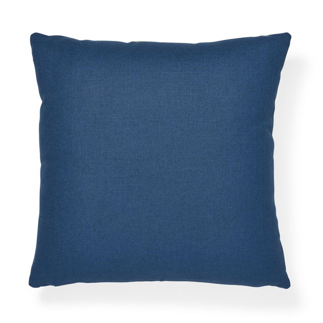 The face of this 20" x 20" pillow features Ibiza Flamestitch in Pool paired with Piet Performance Linen in Harbor. A...