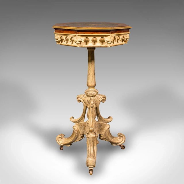 This is an antique decorative side table. A Continental, flip top wine or lamp stand in Regency revival taste, dating to...