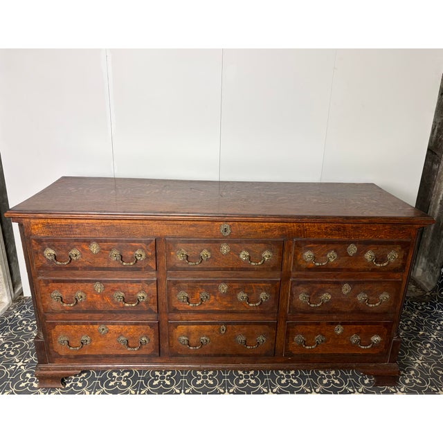 This item is an authentic 18th-century george iii oak lancashire mule chest. the piece exhibits all the hallmarks of a...