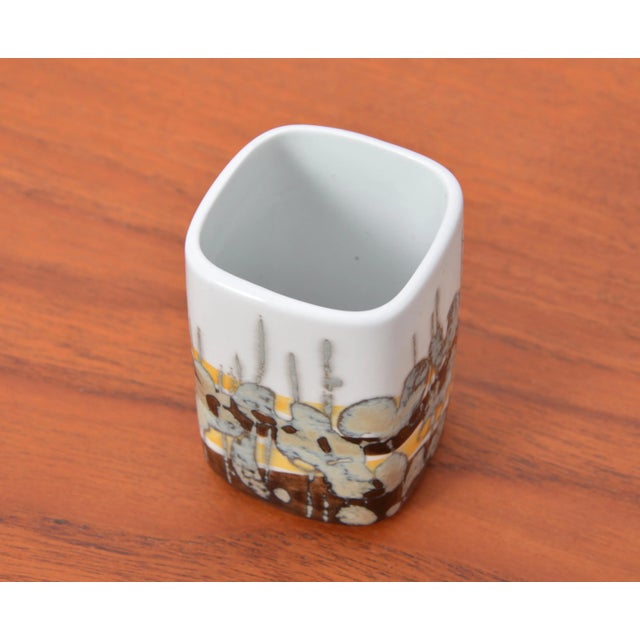 This small ceramic vase or decorative object is part of the Baca series by Ivan Weiss for Royal Copenhagen. This piece has...