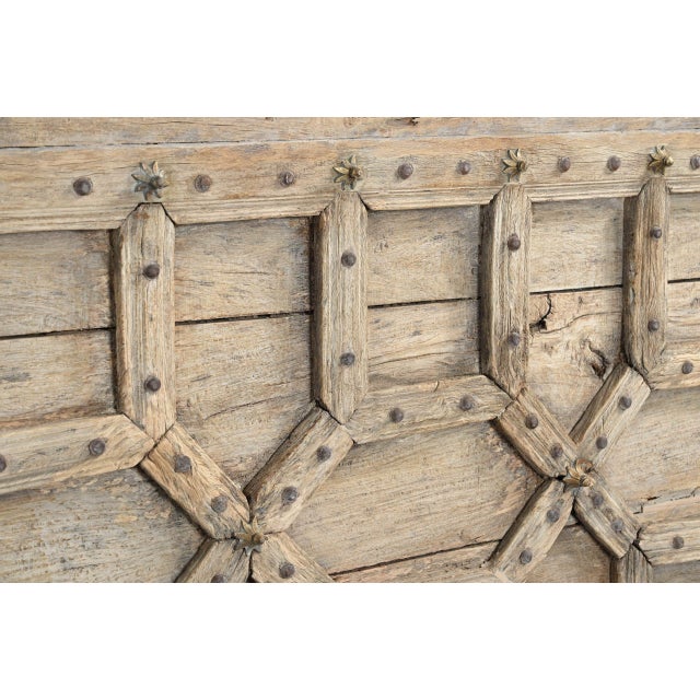 Indian Bleached Teakwood Bar or Shop Counter constructed from antique architectural elements, featuring an antique...