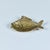 A small brass object in the shape of a fish. The center of the body dips down to form a small well with a variety of uses...