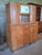 A superb two-part art deco kitchen buffet, dating from the 1940s-1950s, crafted from solid light oak with warm honey and...
