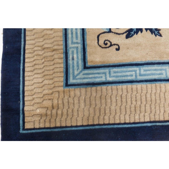 This striking antique Chinese Art Deco rug from the early 1900s is a beautiful example of traditional Peking craftsmanship...