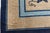 This striking antique Chinese Art Deco rug from the early 1900s is a beautiful example of traditional Peking craftsmanship...