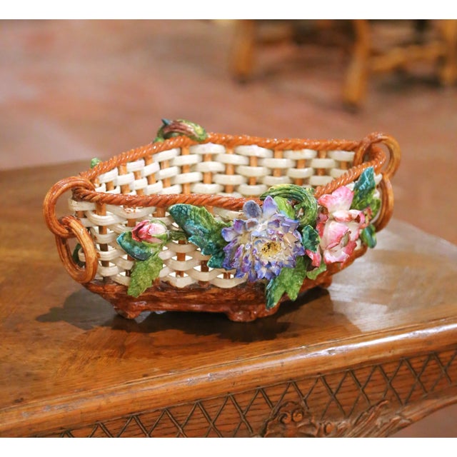 Bring colorful charm and whimsical craftsmanship to a tabletop or console with this elegant antique barbotine jardinière...