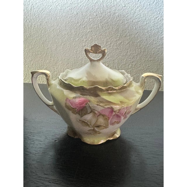 Beautiful antique Rs Prussia porcelain creamer & lidded sugar bowl with pink and white tulip pattern and scalloped gold...