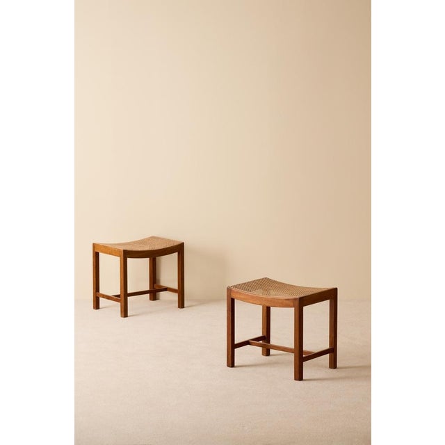 Pair of stools in mahogny and cane, Denmark, 1940s.
