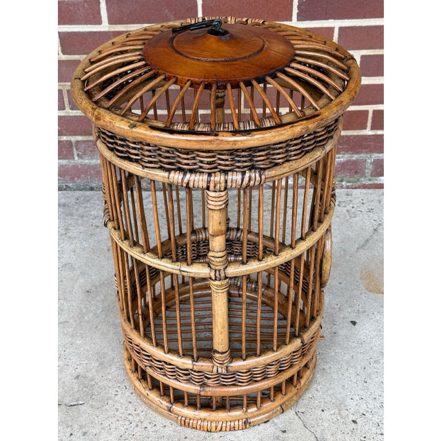 Imagine adding a touch of bohemian elegance to your home with this charming vintage bamboo and rattan birdcage. This...