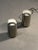 A simple and minimalist pair of cylindrical Table Lamps, "Corfou" model, Post-Modernist, Space-Age, in chrome metal, with...