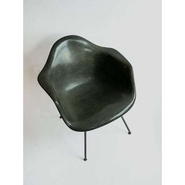 Rare first-generation Eames LAX lounge armchair, manufactured by Zenith Plastics for Herman Miller, circa 1950-1953. This...