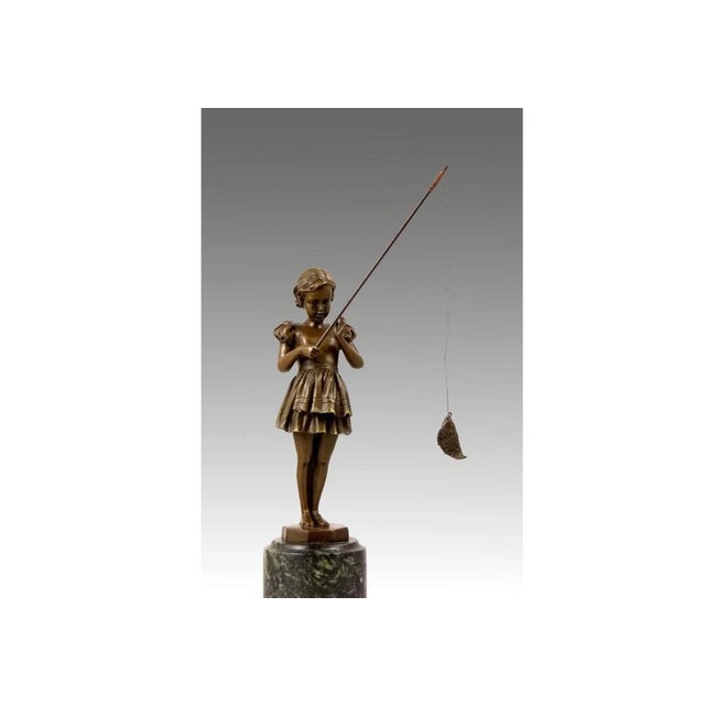 This solid bronze sculpture depicts a young girl standing, holding a fishing rod in a posture of calm and curiosity. The...