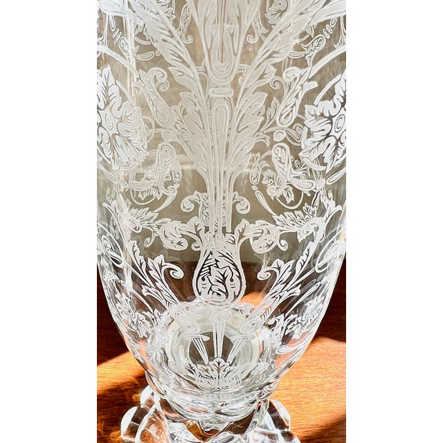 A signed Baccarat crystal Bambou patterned hurricane lamp, c.1920–1940. The candlestick base rises in a graceful baluster...