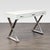 This modern desk features a clean white finish with sleek chrome legs, giving it a contemporary look. It has three...
