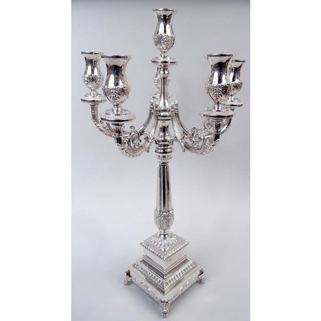 Traditional Neoclassical sterling silver 6-light candelabrum. Raised socket on baluster shaft to which are mounted five...