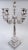 Traditional Neoclassical sterling silver 6-light candelabrum. Raised socket on baluster shaft to which are mounted five...