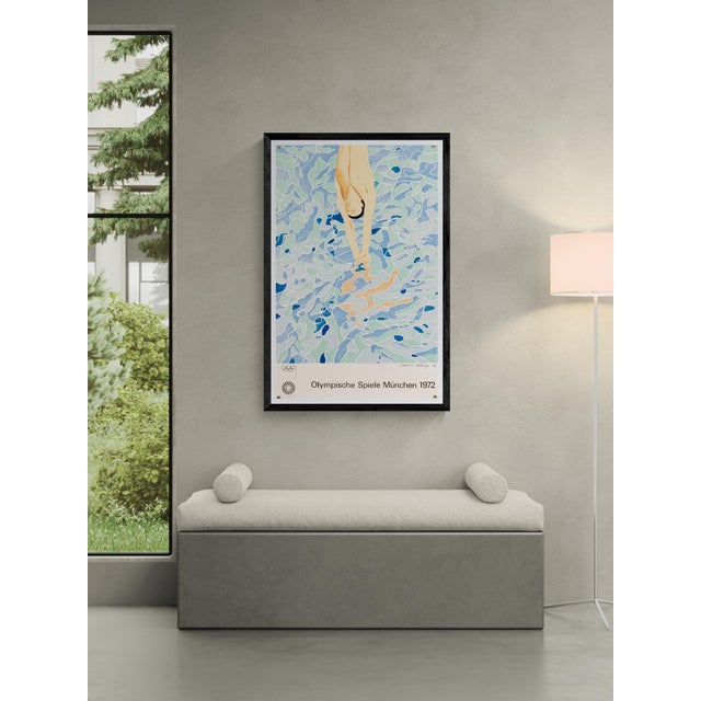 The Piece This official poster for the 1972 Munich Olympic Games features a diver entering a stylized pool of water. The...