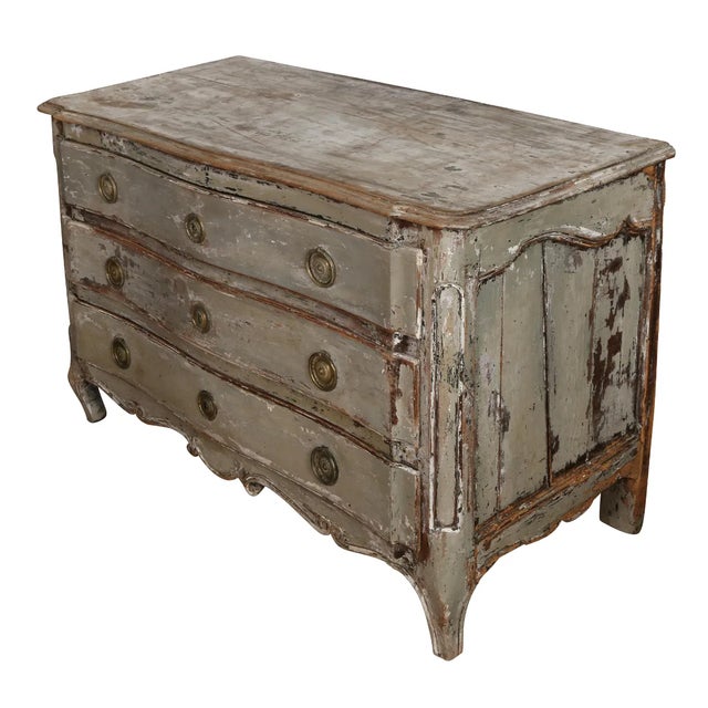 We love this Louis XV style commode for its soft blue/grey finish and the soft patina it has developed over time. This...
