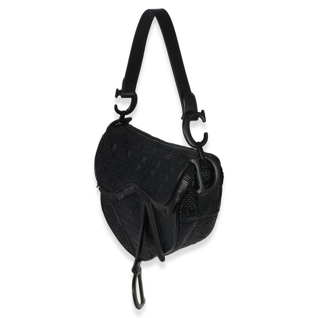 Designed by John Galliano in 1999, Dior's saddle bag made its debut on the SS00 runway. The cowboy-inspired accessory has...