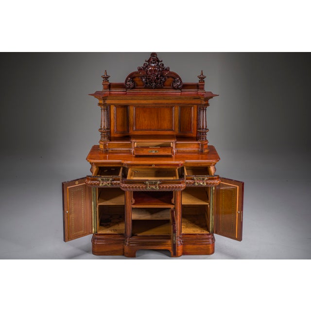 Exceptional late 19th-century German Neo-Baroque buffet cabinet / credenza, crafted in walnut with mahogany elements and...