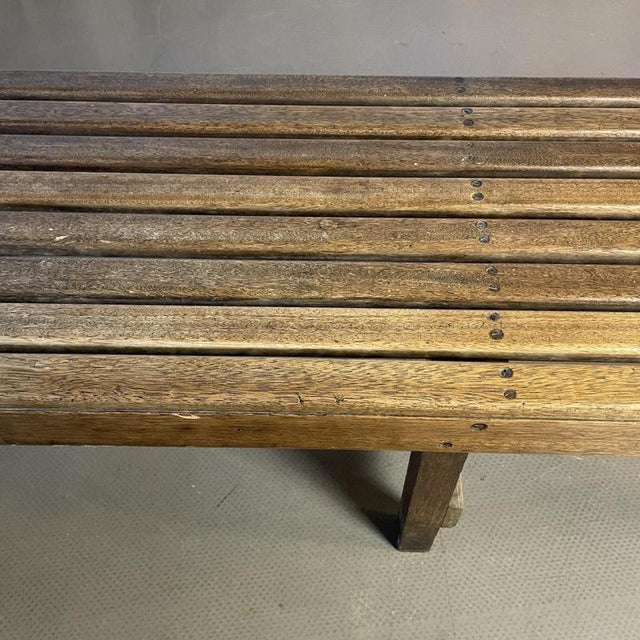 Vintage teak slatted art gallery viewing bench. There are signs of wear and tear, to be expected in a vintage item - a few...
