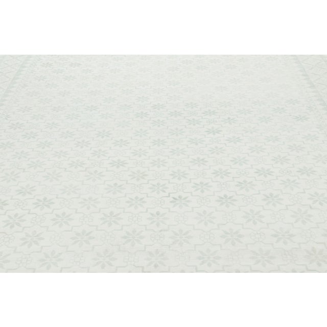 Made with hand-knotted cotton, this 9x12 Dhurrie style rug is an exciting new addition to Rug and Kilim’s Modern Classics...