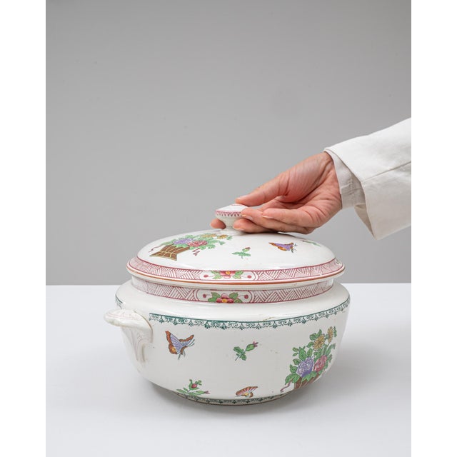 This 20th Century French special edition porcelain tureen is a vibrant and decorative piece distinguished by its charming...