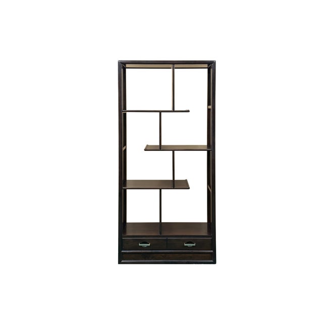 Elevate your living space with this striking Asian-inspired asymmetrical open shelving unit, a masterclass in balancing...