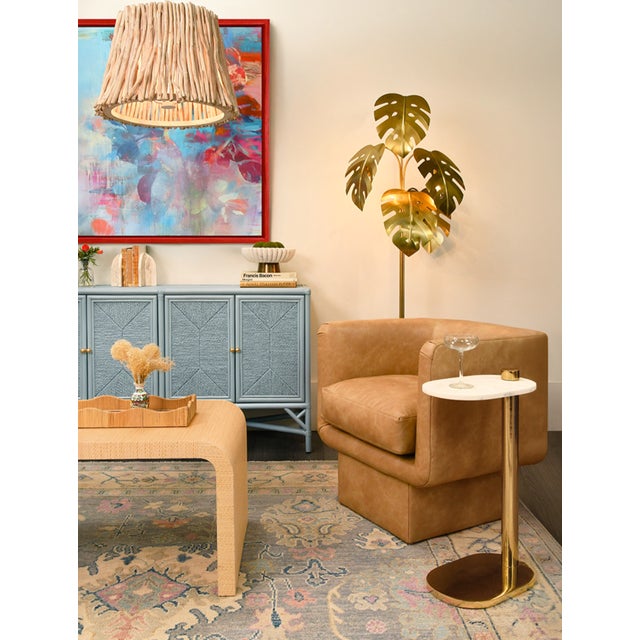 New special order item. Not vintage. The Simeon side table is a luxurious oval shaped table made of polished brass and...