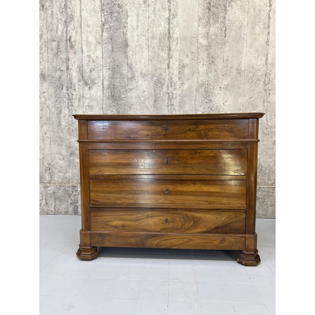 Dimensions: 118.5cm wide x 53cm deep x 94cm high. Drawers 95.5cm wide x 42cm deep x 10cm, 14cm, 14cm, and 21cm high This...