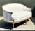 This exquisite French Louis XVI style canapé is a masterclass in Neoclassical elegance and artisanal craftsmanship. The...