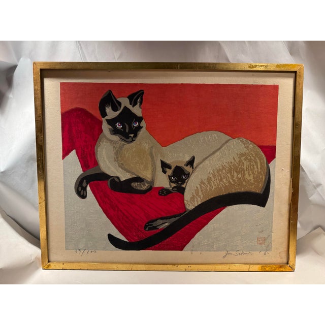 This listing is for a Mid-Century Japanese woodblock print depicting Siamese cats. This piece is an original signed print...